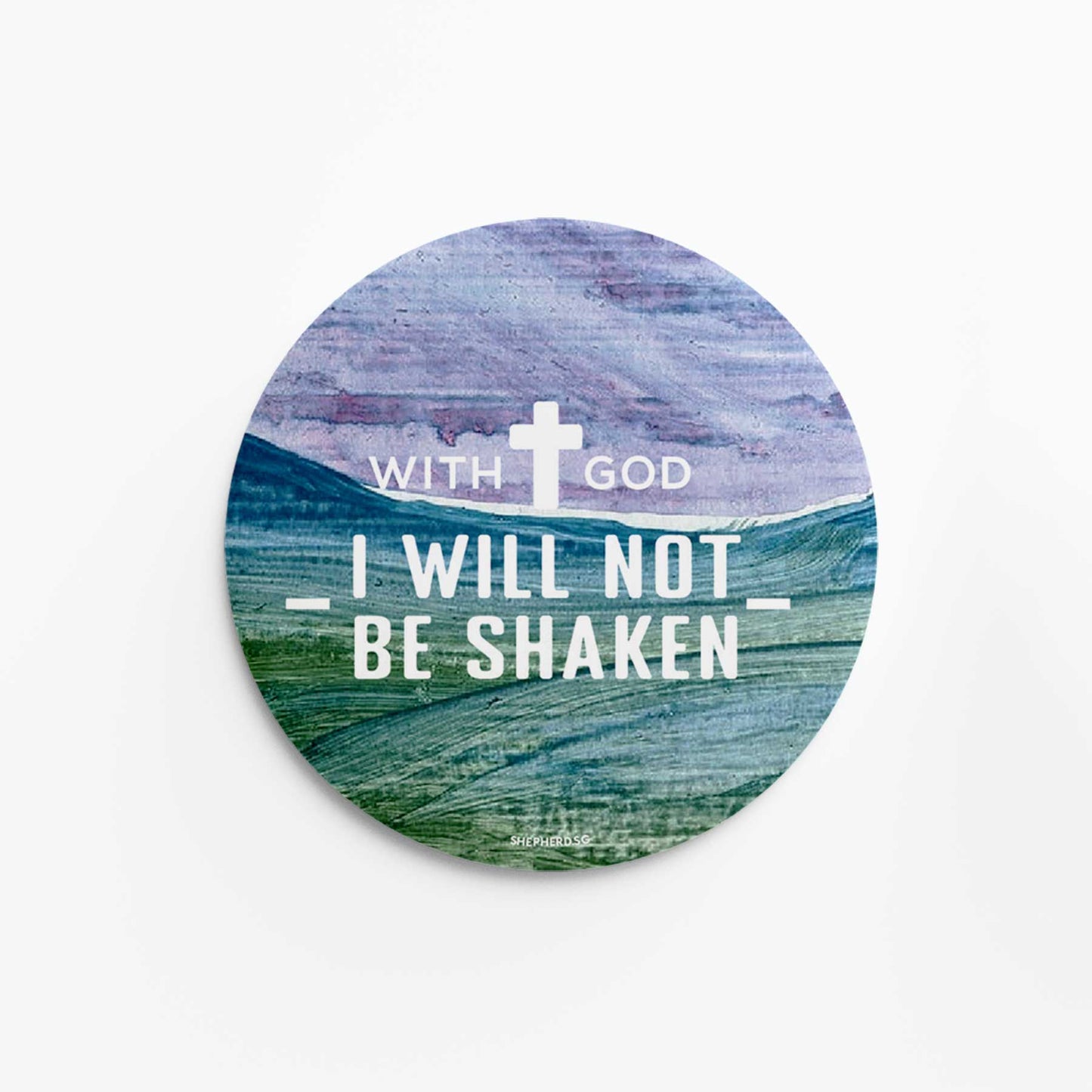 Round pin badge with nature abstract design and "With God I Will Not Be Shaken" and a cross on a white background
