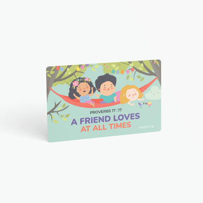 A curved corner wallet card size sticker for children standing in landscape on a white background with text "A friend loves at all times" Proverbs 17:17