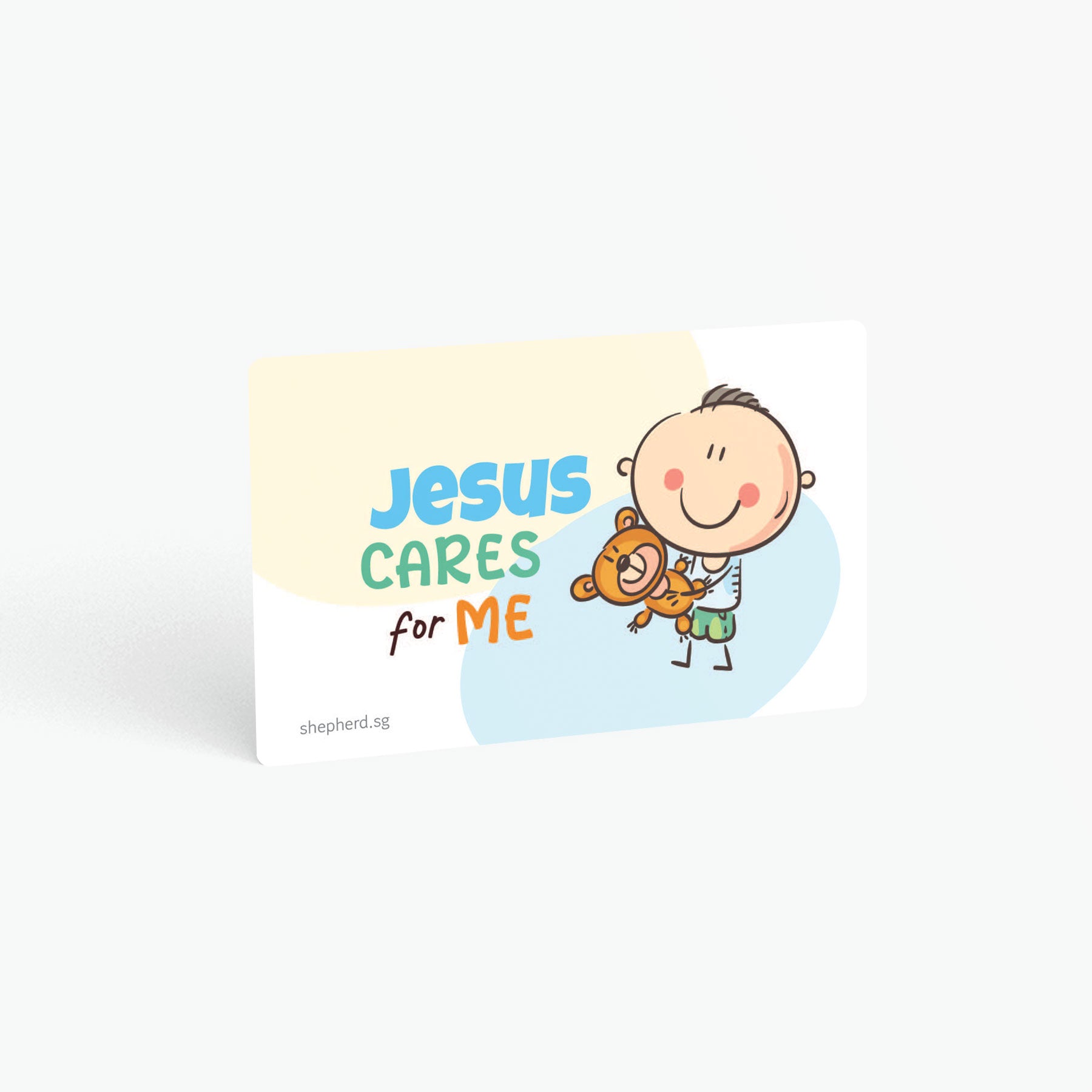 A curved corner wallet card size sticker for children standing in landscape on a white background with text "Jesus cares for me"