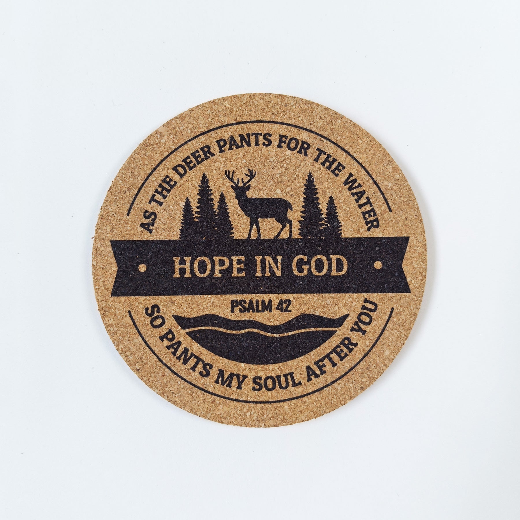 Circle cork coaster with Bible verse Psalm 42 and deer design on a white background