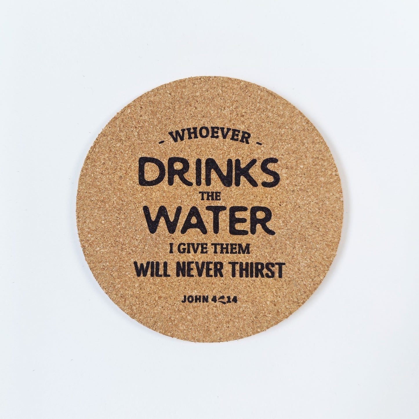 Circle cork coaster with Bible verse John 4:14 on a white background