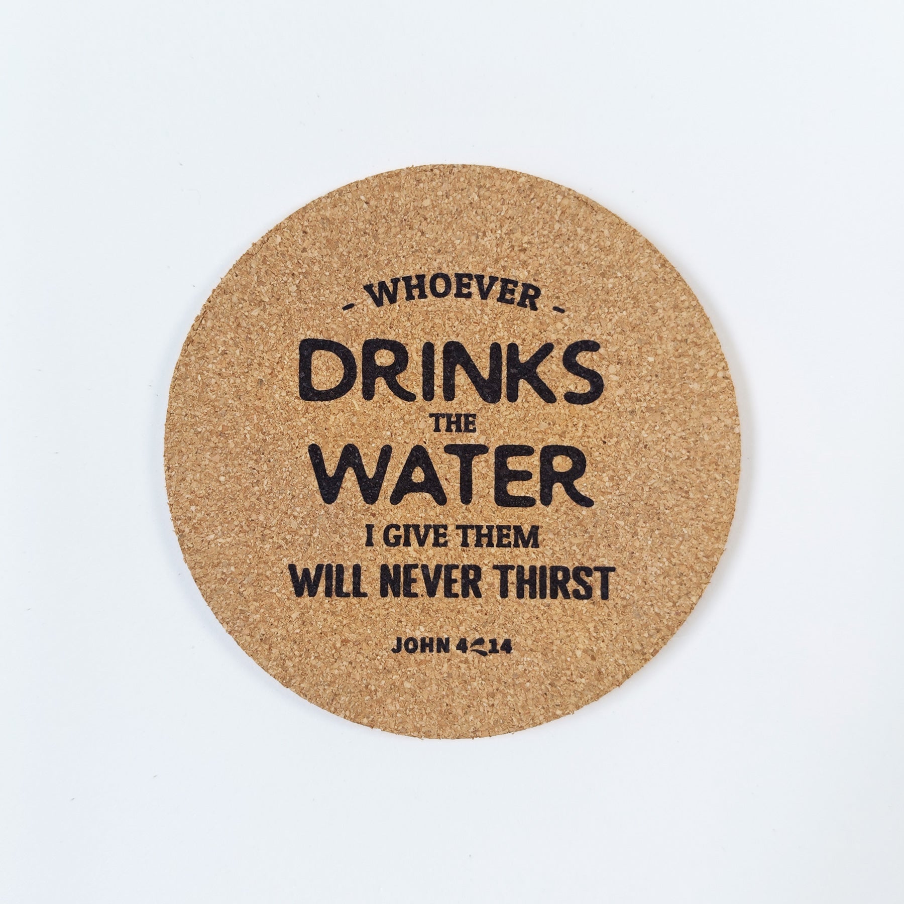 Circle cork coaster with Bible verse John 4:14 on a white background