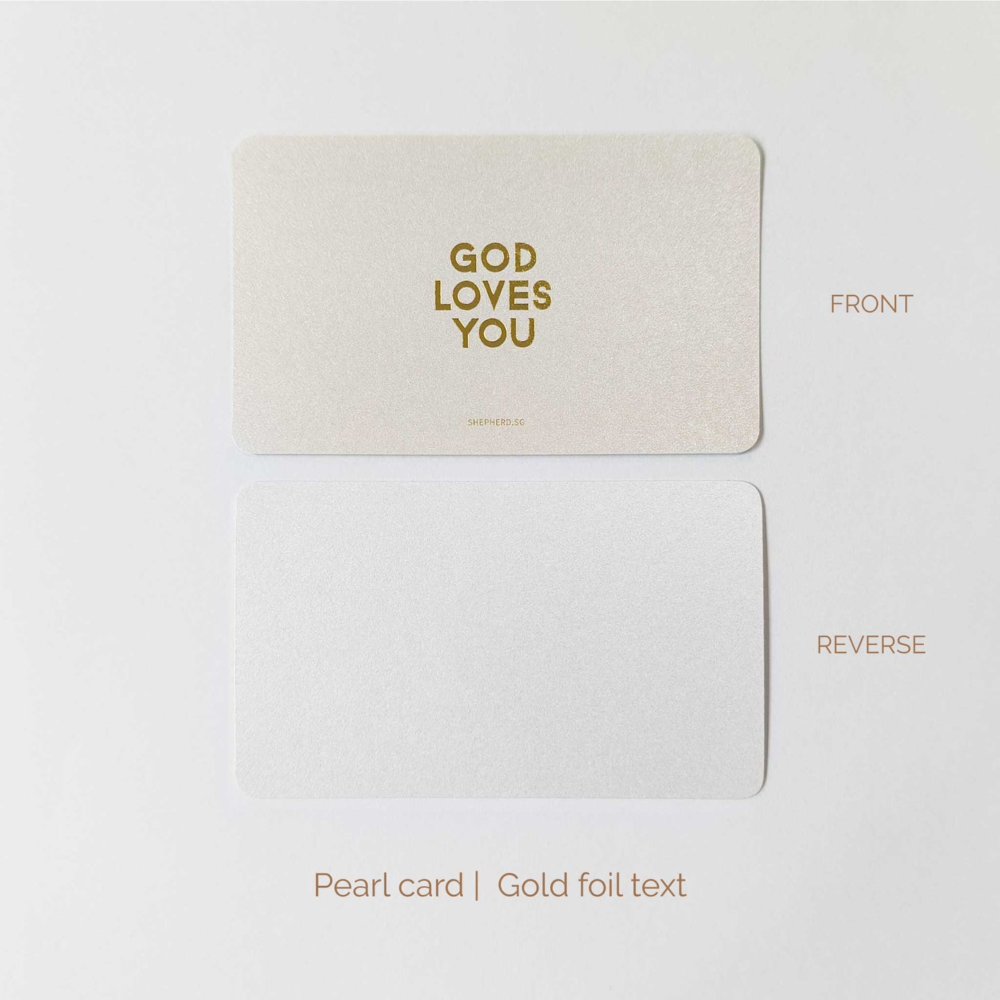 Pearl card with gold foil text 'GOD LOVES YOU' on a white background, shown from front and reverse sides.