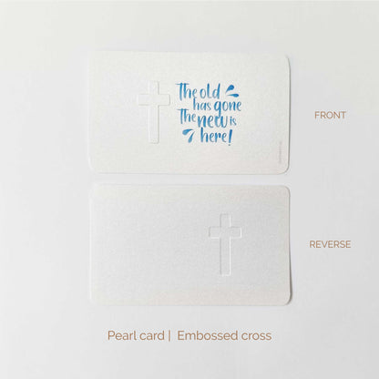 Pearl card with an embossed cross and blue text 'The old has gone the new is here' on a white background, shown from front and reverse sides.