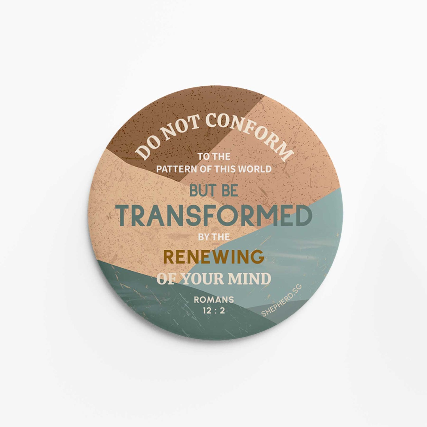 Round pin badge with "Do Not Conform to the Pattern of This World" on an earthy abstract pattern with a white background