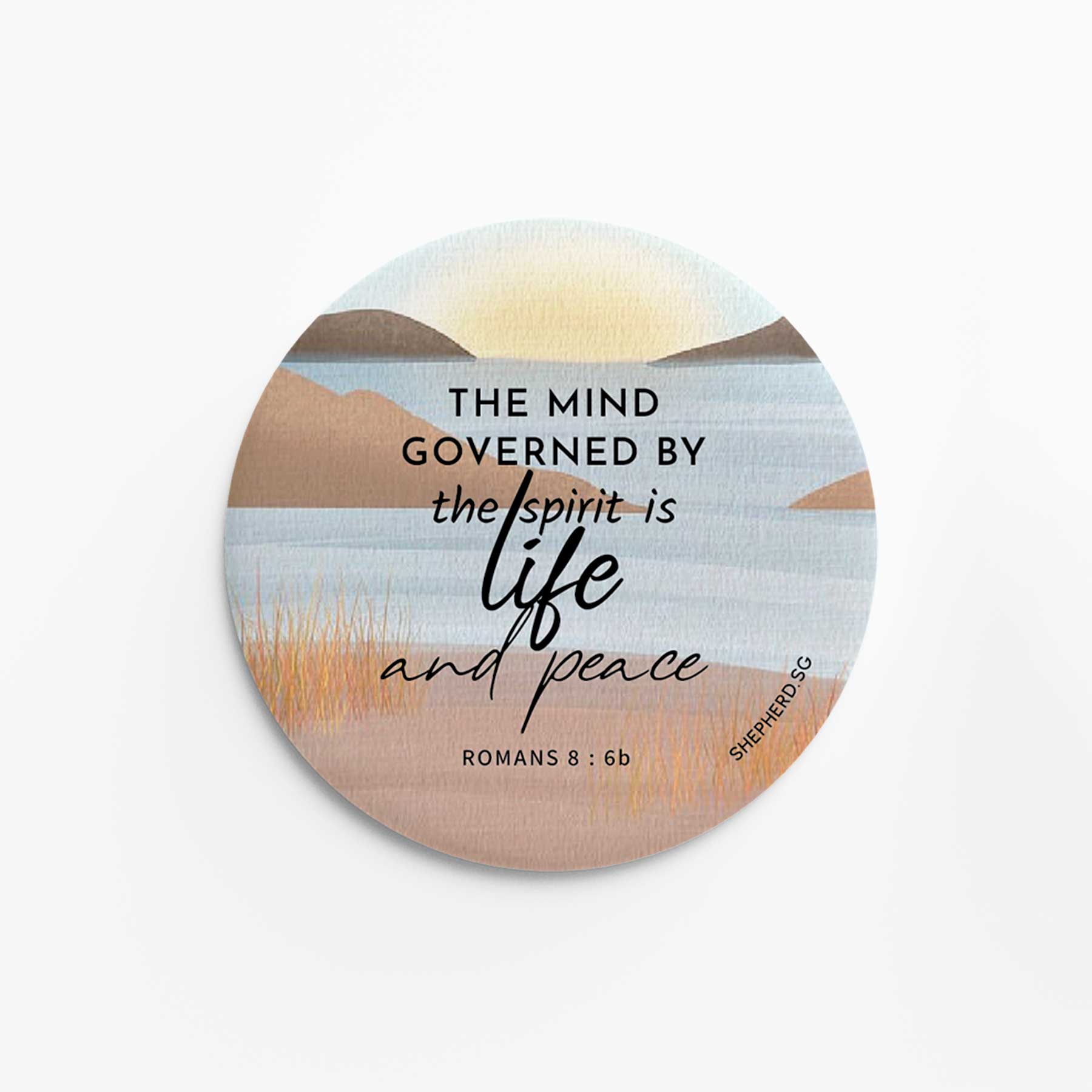 Round pin badge with "The mind governed by the spiriti s life and peace" on a peaceful coastal pattern on a white background