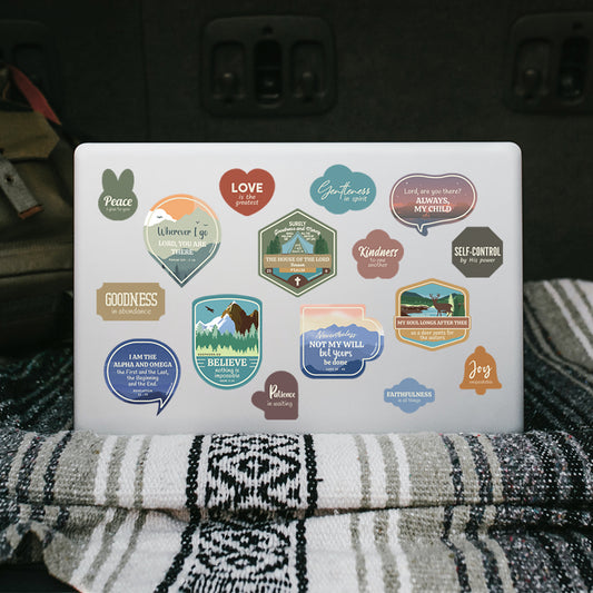 Laptop with various Christian stickers designed by shepherd.sg