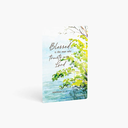 A curved corner wallet card size sticker standing vertically on a white background with Bible verse Jeremiah 17:7 Blessed is the man who trusts in the Lord