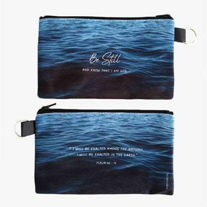 pouch front reverse view with bible verse psalm 46 verse 10 be still and know on deep blue sea background
