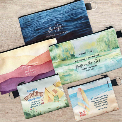 christian zipper pouches with bible verses for all ages on a wooden table top