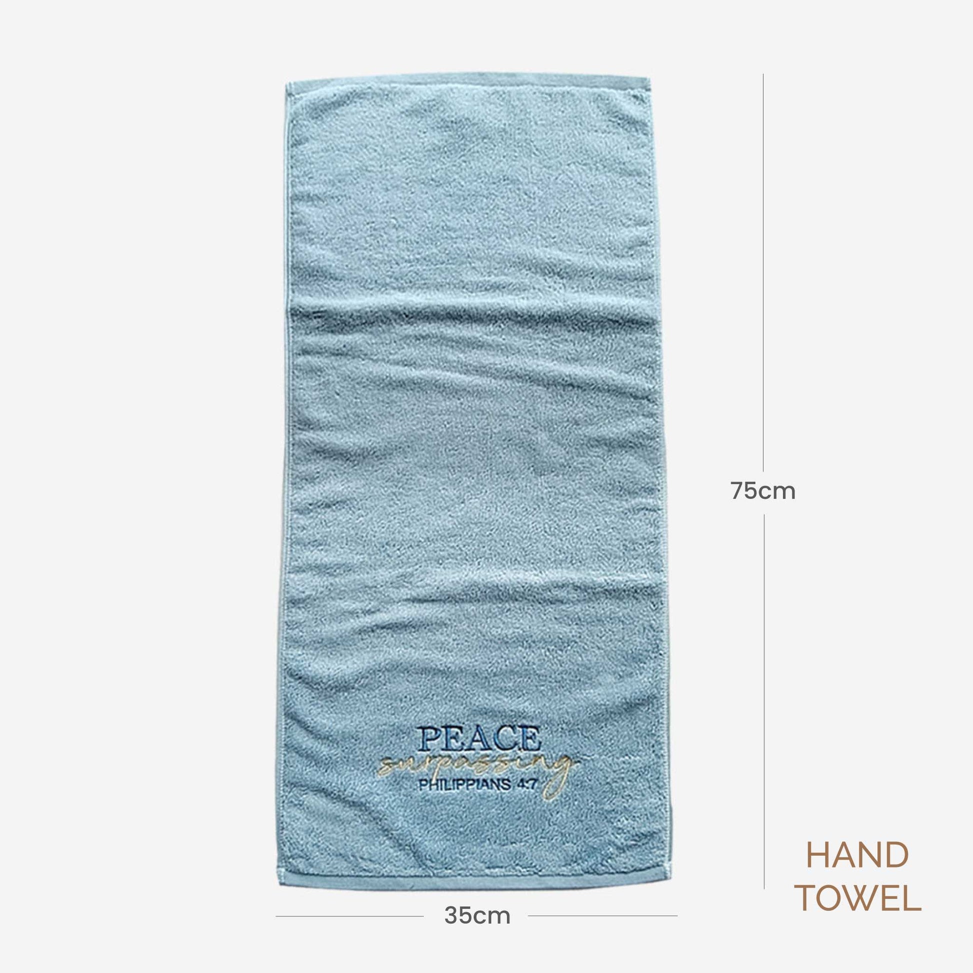 Turquoise hand towel with 'PEACE surpassing Philippians 4:7' embroidery, shown with dimensions on a white background.