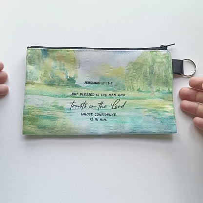 video of a christian zipper pouch at all angles on a white background
